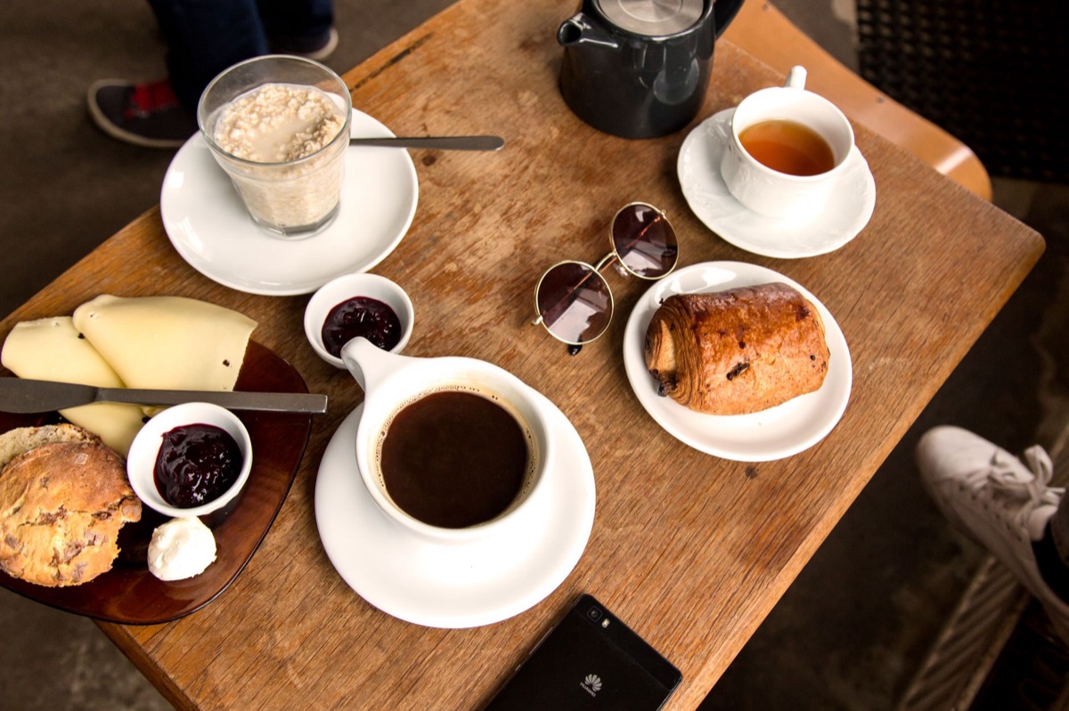 Traditional British afternoon tea set with scones and tea