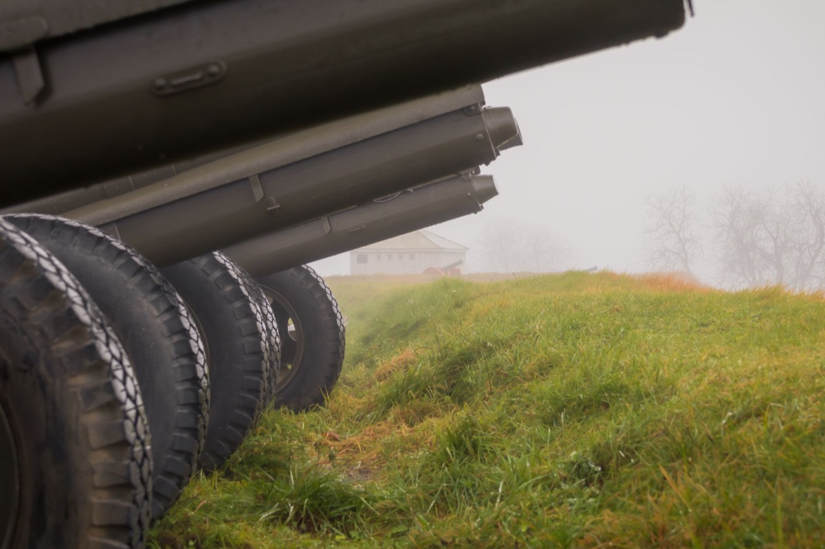 battlefield battlefield with rusted cannons and fallen soldiers