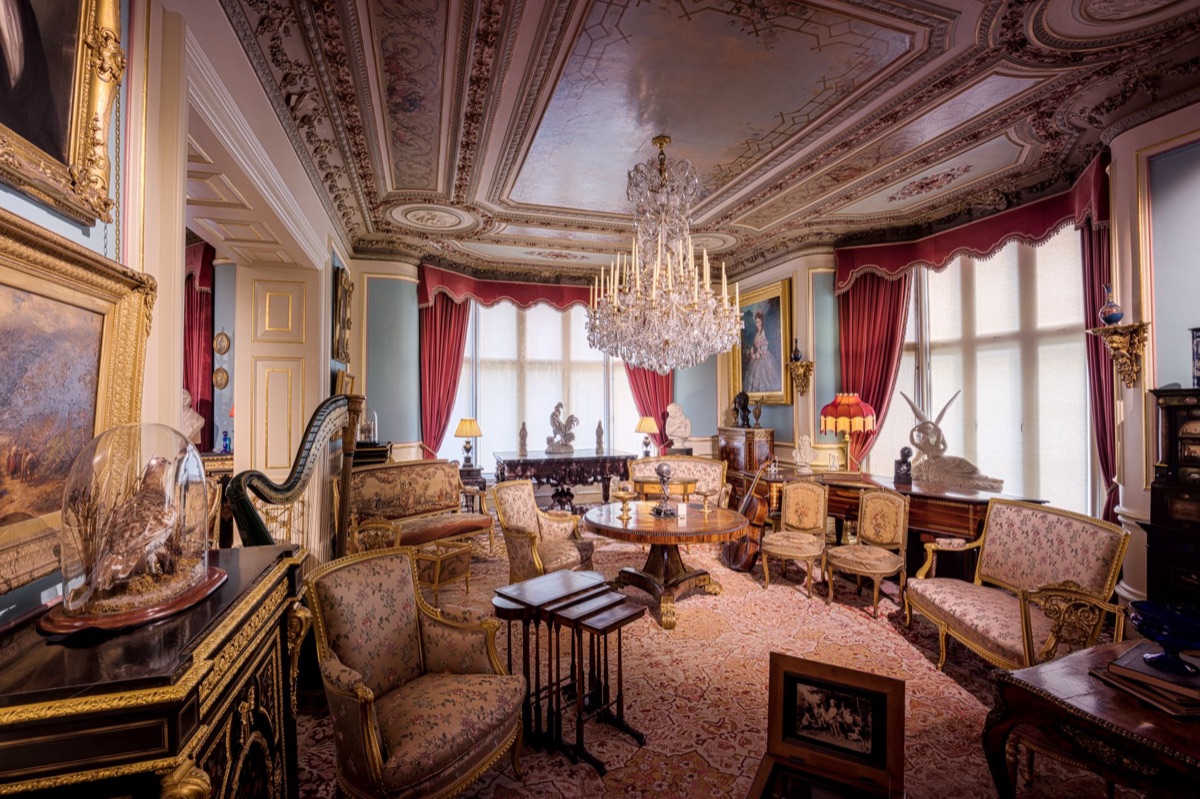 furniture and portraits in old atlanta mansion