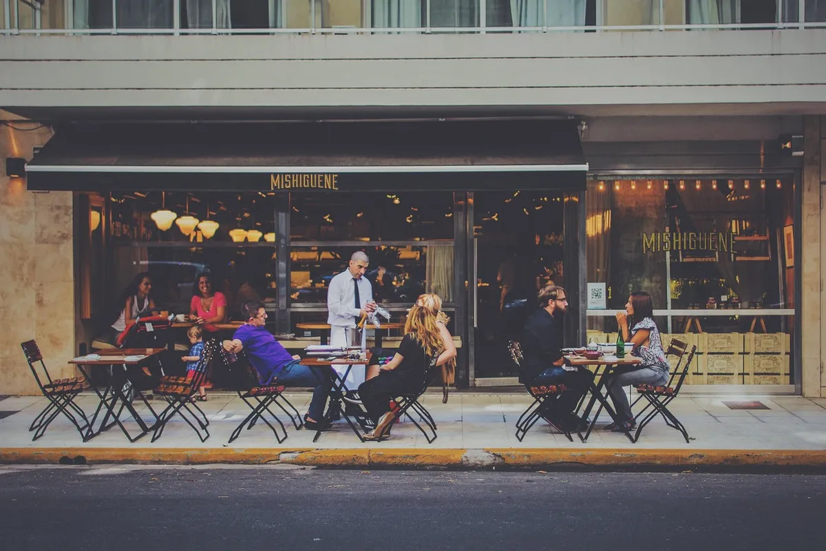 outdoor dining, restaurant, bar, waiter, al fresco, city, customers, group, patrons, people, street, tables, chairs, restaurant, restaurant, restaurant, restaur